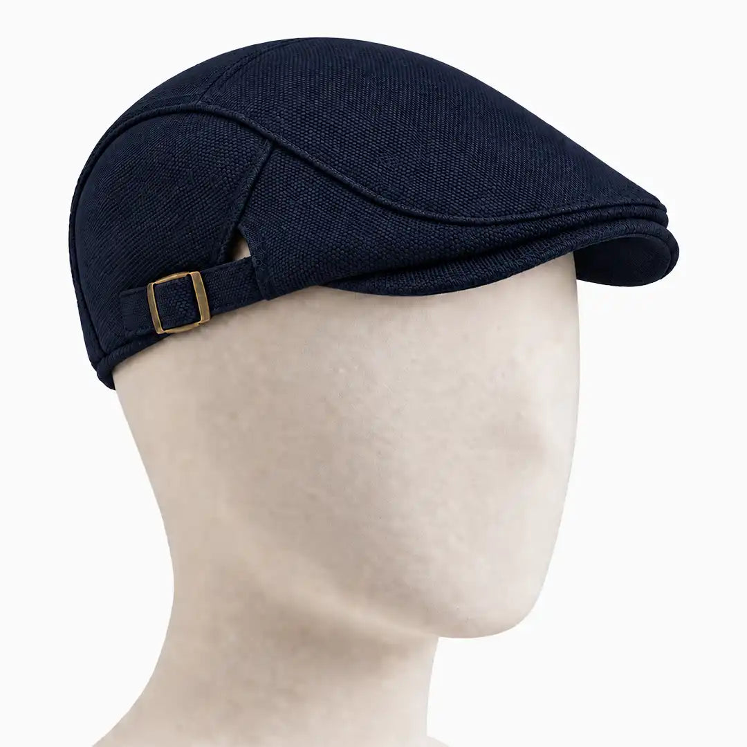 Béret casquette Rodolphe en polyester bleu marine, porté sur une tête de mannequin