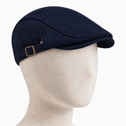 Béret casquette Rodolphe en polyester bleu marine, porté sur une tête de mannequin