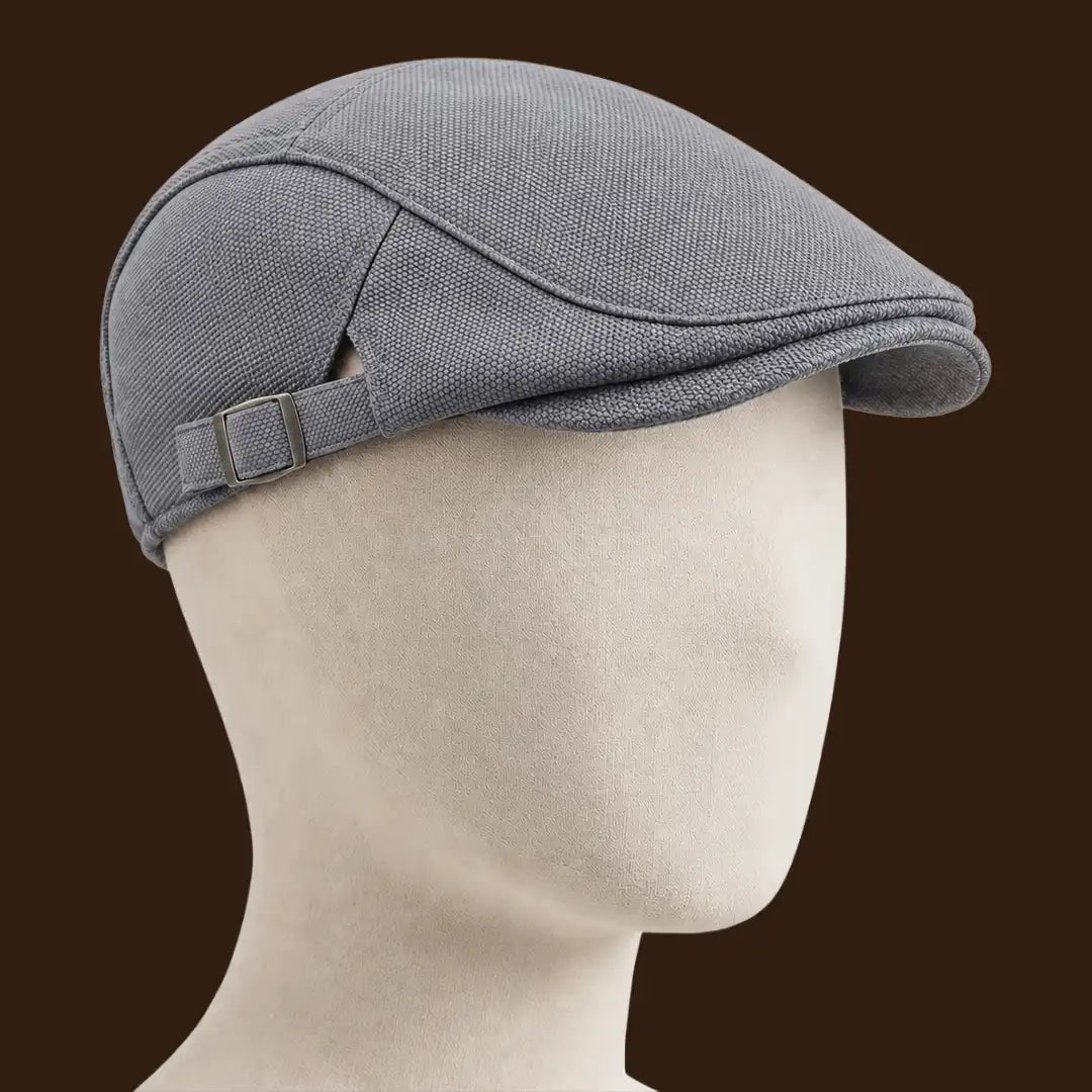 Béret casquette Rodolphe en polyester gris, porté sur une tête de mannequin