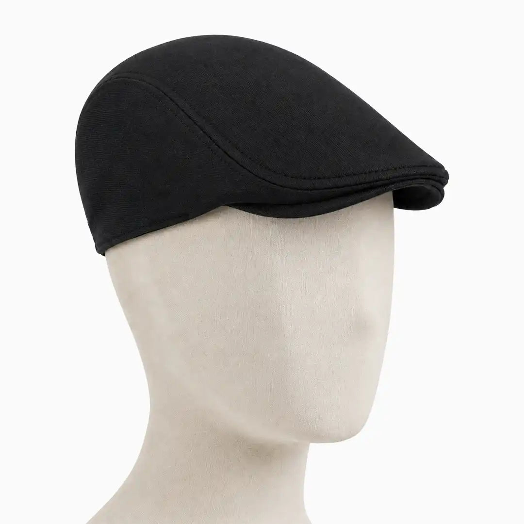 Béret casquette Christophe en coton noir porté