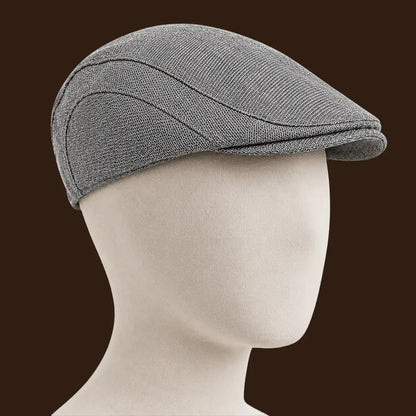 Béret casquette Bruno en mélange coton et polyester gris clair porté
